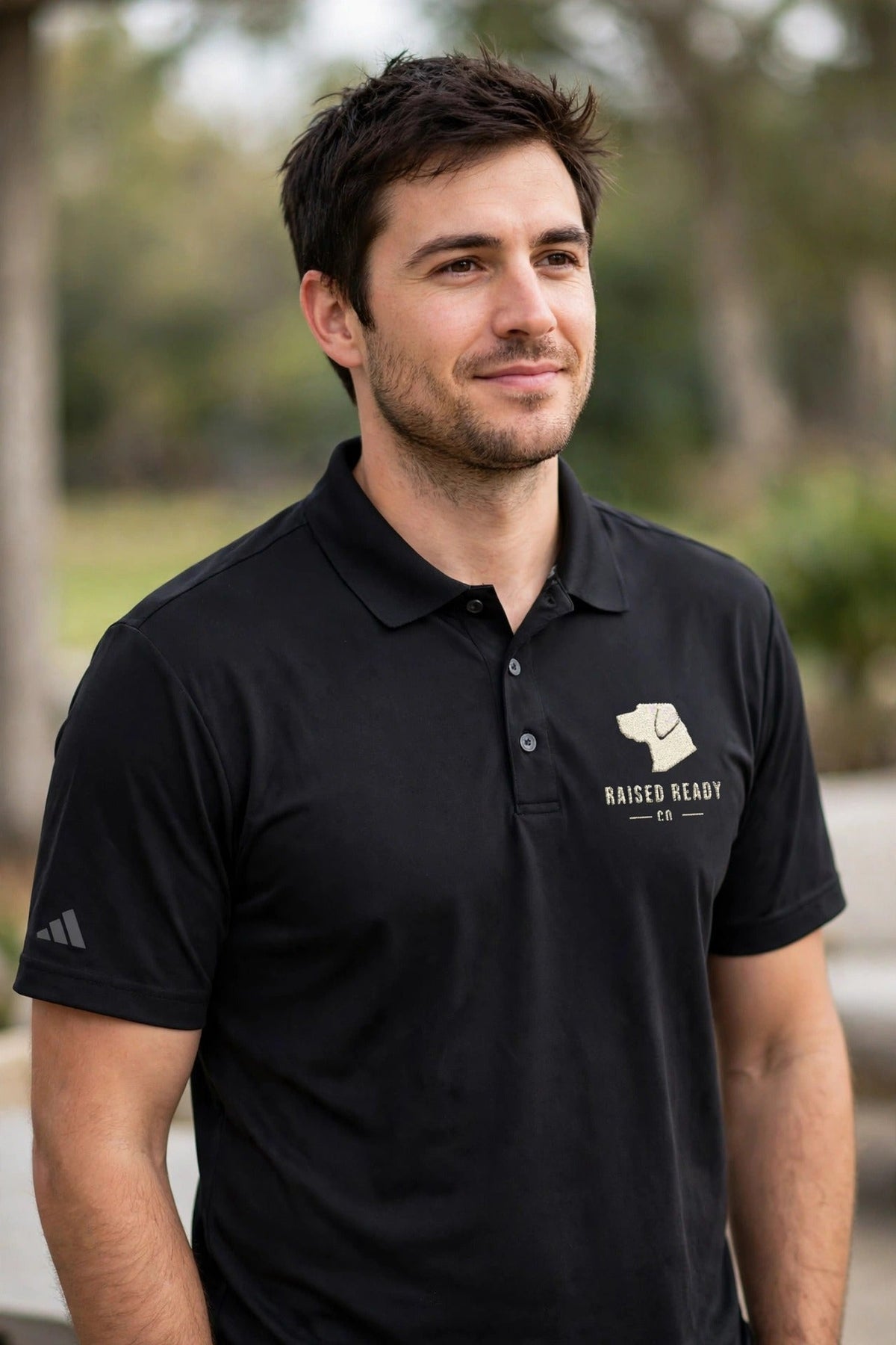 adidas polo worn by a man, black