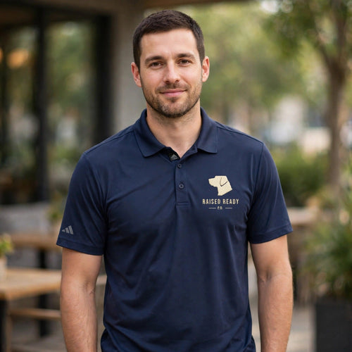 adidas polo worn by a man, navy